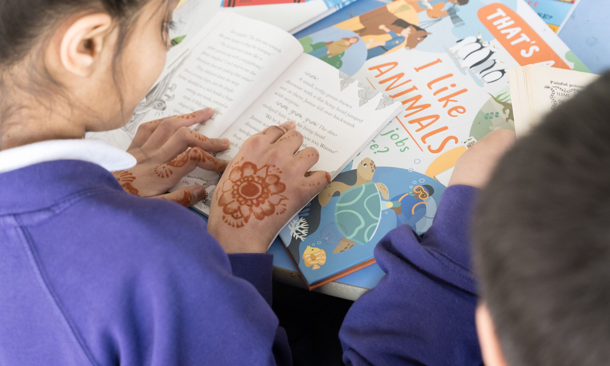 Eastwood Community School - Pupil reading in class
